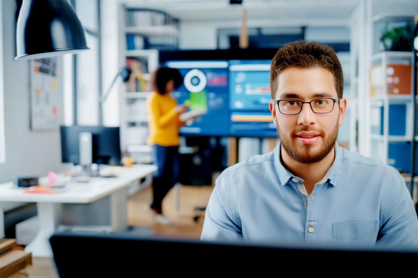 Lifelike professional photography, bright and modern office setting. A focused individual PR manager at a clean desk within a company office, deeply engaged in a video call with a journalist on their laptop, a company branded mug nearby, symbolizing dedicated in-house PR and deep brand connection.