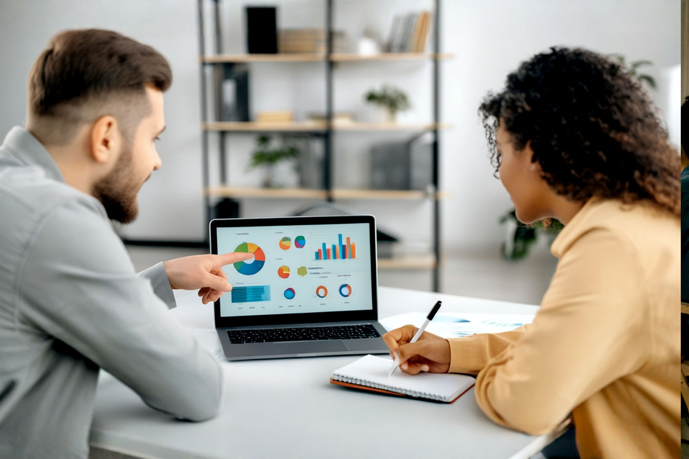 Lifelike pro photography, eye-level shot: A pair of focused marketers are collaborating around a sleek, modern desk. One is pointing at a laptop screen displaying a vibrant content marketing dashboard with charts and graphs. Another is taking notes in a Moleskine-style notebook. The third is looking thoughtfully at the screen. Soft, natural office lighting. Background shows a clean, contemporary office environment with a bookshelf filled with marketing books slightly blurred. The overall mood is professional, innovative, and collaborative. Emphasize realistic details and a bright, engaging atmosphere.