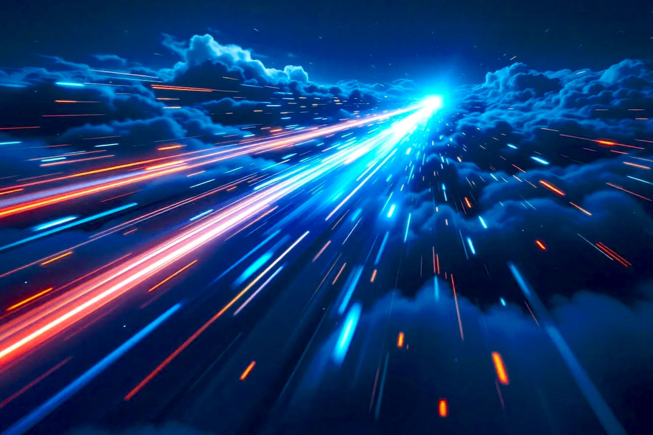 The image is an abstract representation of high-speed data transfer or light streaks cutting through a dark, cloudy sky at night. In the center, a powerful, bright blue light beam shoots diagonally upwards and to the right, creating a sense of rapid movement and a focal point. Accompanying this main beam are numerous parallel streaks of light, primarily in shades of vibrant blue and orange-red, trailing behind it. These streaks vary in length and intensity, suggesting varying speeds or data packets. Some appear as solid lines, while others are segmented, like dashes. The background consists of dark, voluminous clouds, illuminated from below and within by the light streaks, giving them a dynamic and somewhat ominous presence. The overall color scheme is dominated by deep blues and blacks in the sky and clouds, contrasted sharply with the glowing blues and oranges of the light trails. The perspective is a wide-angle shot looking up, enhancing the feeling of speed and vastness. The image evokes themes of technology, speed, connectivity, and digital information flow.